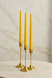 Yellow taper candle