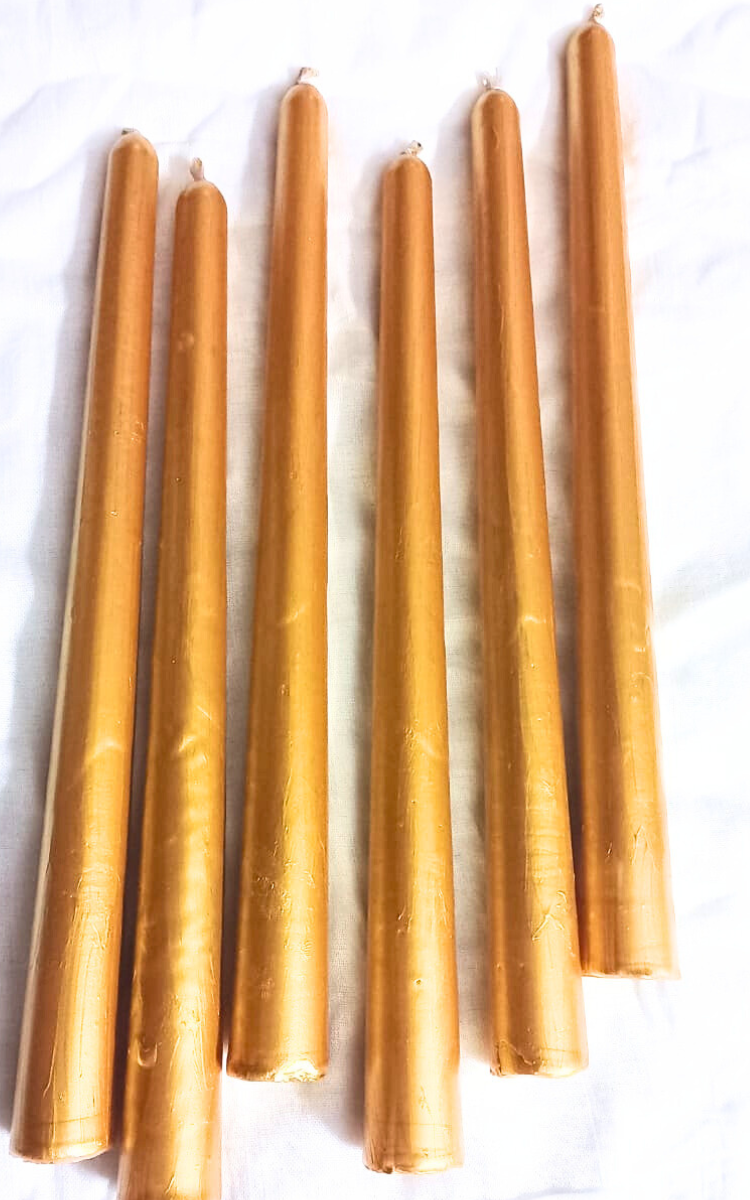 golden painted taper candles